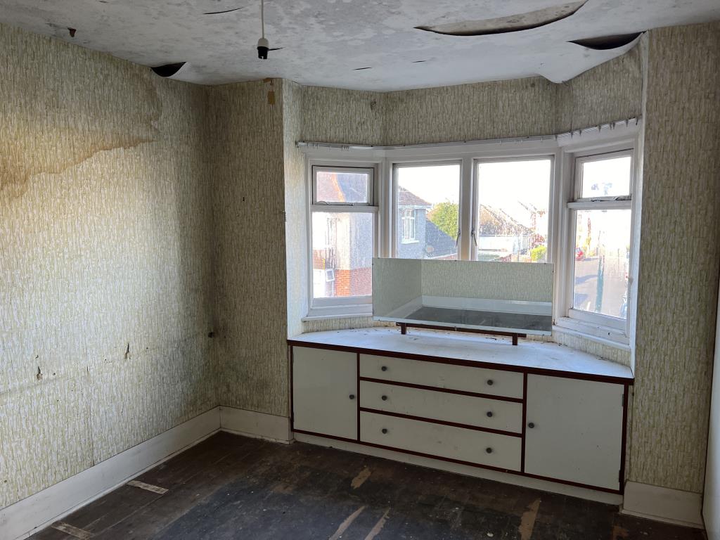 Lot: 71 - HOUSE FOR IMPROVEMENT - Wallpaper walls with wooden floorboards and bay window